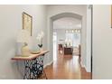 Bright entryway with hardwood floors and view to living room at 603 Tuttle Rd, Durham, NC 27703