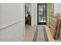 Bright entryway with a patterned rug and green front door at 108 Pinewood Ave, Rocky Mount, NC 27804