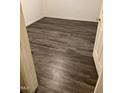 Simple bedroom with wood-look vinyl flooring at 1911 Wolftech Ln # 102, Raleigh, NC 27603