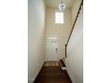 Two-story entryway with hardwood floors, and staircase at 248 Begen St, Morrisville, NC 27560