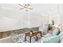 Bright living room featuring hardwood floors and a cozy seating area at 435 Iris Bryant Rd, Dunn, NC 28334