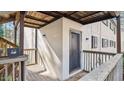 Private entrance with wooden deck and railing at 550 Pine Ridge Pl, Raleigh, NC 27609