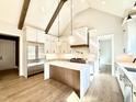 Modern gourmet kitchen featuring stainless steel appliances, and a large island at 5820 Shawood Dr, Raleigh, NC 27609