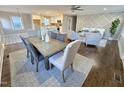 Spacious living area with hardwood floors, dining area, and stylish decor at 1014 E Jones St, Raleigh, NC 27601