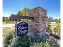 Eatmon's Landing community entrance sign with stone pillars at 16 Sourgum Ct Ct, Zebulon, NC 27597