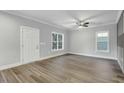 Bright and spacious living area with hardwood floors and neutral walls at 1000 N Mckay St, Dunn, NC 28334