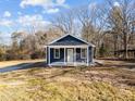 Newly renovated home with a large yard, perfect for outdoor living at 1917 Faucette Ave, Durham, NC 27704
