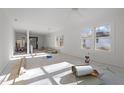 Spacious living room with large windows and ample natural light at 1917 Faucette Ave, Durham, NC 27704
