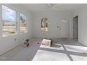 Bright and airy living room with new flooring and fresh paint at 1917 Faucette Ave, Durham, NC 27704