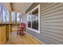 Charming front porch with rocking chair and wooden railings at 512-A E Graham St, Mebane, NC 27302