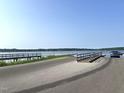 Community lake access point with boat ramp and dock system for residents at 69 N Movado Trl, Kenly, NC 27542