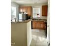 Open kitchen with stainless steel appliances and breakfast bar at 814 Providence Glen Dr, Chapel Hill, NC 27514