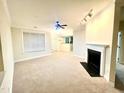 Bright living room featuring a fireplace and an open floor plan at 814 Providence Glen Dr, Chapel Hill, NC 27514
