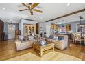 Spacious living room with hardwood floors and exposed beams at 8437 Charlie Stovall Rd, Oxford, NC 27565