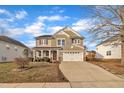 Two-story house with a neutral color scheme and a two-car garage at 309 Coalyard Dr, Garner, NC 27529