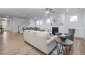 Open living room and dining area with hardwood floors and neutral decor at 4809 Bristol Meadow Dr, Raleigh, NC 27603