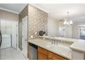 Kitchen features double sink, dishwasher, and pantry at 617 Eyam Hall Ln, Apex, NC 27502