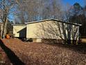 Side view of manufactured home showing exterior condition at 165 Wakeline Dr, Wendell, NC 27591