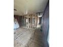 Unfinished interior room, new framing, and wood flooring at 715 Star St, Rocky Mount, NC 27804