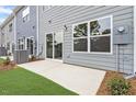 Private patio with sliding door, providing seamless indoor-outdoor living experience at 124 Fideaux Blvd # 256, Raleigh, NC 27603