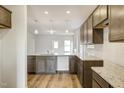Kitchen with granite countertops and wooden cabinets at 142 Vega Loop, Sanford, NC 27330