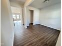Spacious living room featuring beautiful wood floors and neutral walls at 154 Vega Loop, Sanford, NC 27330