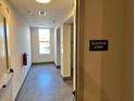 Clean and bright elevator lobby with tiled floors at 2225 Gathering Square Ct # 2225, Fuquay Varina, NC 27526