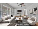 Virtually staged living room with contemporary furnishings and stylish decor at 704 Sunnybrook Rd, Raleigh, NC 27610