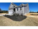 Charming single-Gathering home on a large lot with landscaped yard at 82 N Stagecoach Dr, Wendell, NC 27591