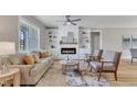 Comfortable living room with a modern fireplace and plenty of seating at 9342 Turkey Way, Middlesex, NC 27557
