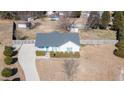 House with gray roof and fenced-in yard, viewed from above at 110 Mocha Ln, Clayton, NC 27520