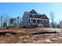 Two-story home with side porch and wooded lot at 1410 Reading Ct # 92Kl, Burlington, NC 27217