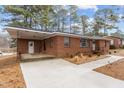 Ranch house with carport and landscaped yard at 416 N Cheatham St, Franklinton, NC 27525