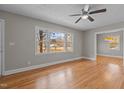 Hardwood floors and large window in living room at 416 N Cheatham St, Franklinton, NC 27525