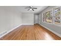 Hardwood floors, neutral walls, and ceiling fan at 416 N Cheatham St, Franklinton, NC 27525