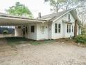 Attached carport providing convenient covered parking and access to the rear entrance at 504 Washington St, Raleigh, NC 27605