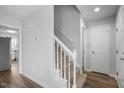 Bright entryway with staircase, hardwood floors, and neutral walls at 5321 Baywood Forest Dr, Knightdale, NC 27545