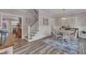 Elegant dining room featuring hardwood floors and a stylish chandelier at 63 Eastland Ct, Smithfield, NC 27577
