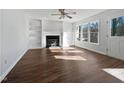 Spacious living room featuring hardwood floors and a fireplace at 118 Trafalgar Ln, Cary, NC 27513