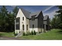 Two-story house with white brick and gray siding, a gabled roof, and landscaping at 2650 Marchmont Street St, Raleigh, NC 27608