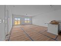 Spacious living room with large windows and sliding glass door at 2995 Faucette Ln, Burlington, NC 27217