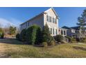 Desirable home featuring mature landscaping and welcoming curb appeal with covered front porch at 30155 Pharr, Chapel Hill, NC 27517