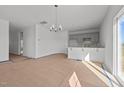 Open concept dining area with kitchen and access to other rooms at 3615 Nc-62, Burlington, NC 27217