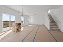 Open concept dining room with stairs and kitchen at 3649 Nc-62, Burlington, NC 27217