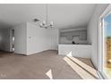 Bright dining room with kitchen and sliding glass doors at 3655 Nc-62, Burlington, NC 27217