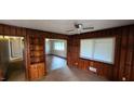 Living room with built-in shelving and hardwood floors at 4224 Us 401, Louisburg, NC 27549