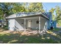 Detached garage with covered carport and concrete slab at 621 Shepard School Rd, Zebulon, NC 27597