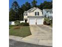 Two-story house with double garage and fenced backyard at 7309 Brighton Hill Ln, Raleigh, NC 27616