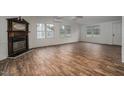 Spacious living room with hardwood floors and a fireplace at 95 Old Barn Ct, Rocky Mount, NC 27801