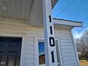 Close-up of the address marker for 1101 at 1101-1103 N Anthony St, Burlington, NC 27217